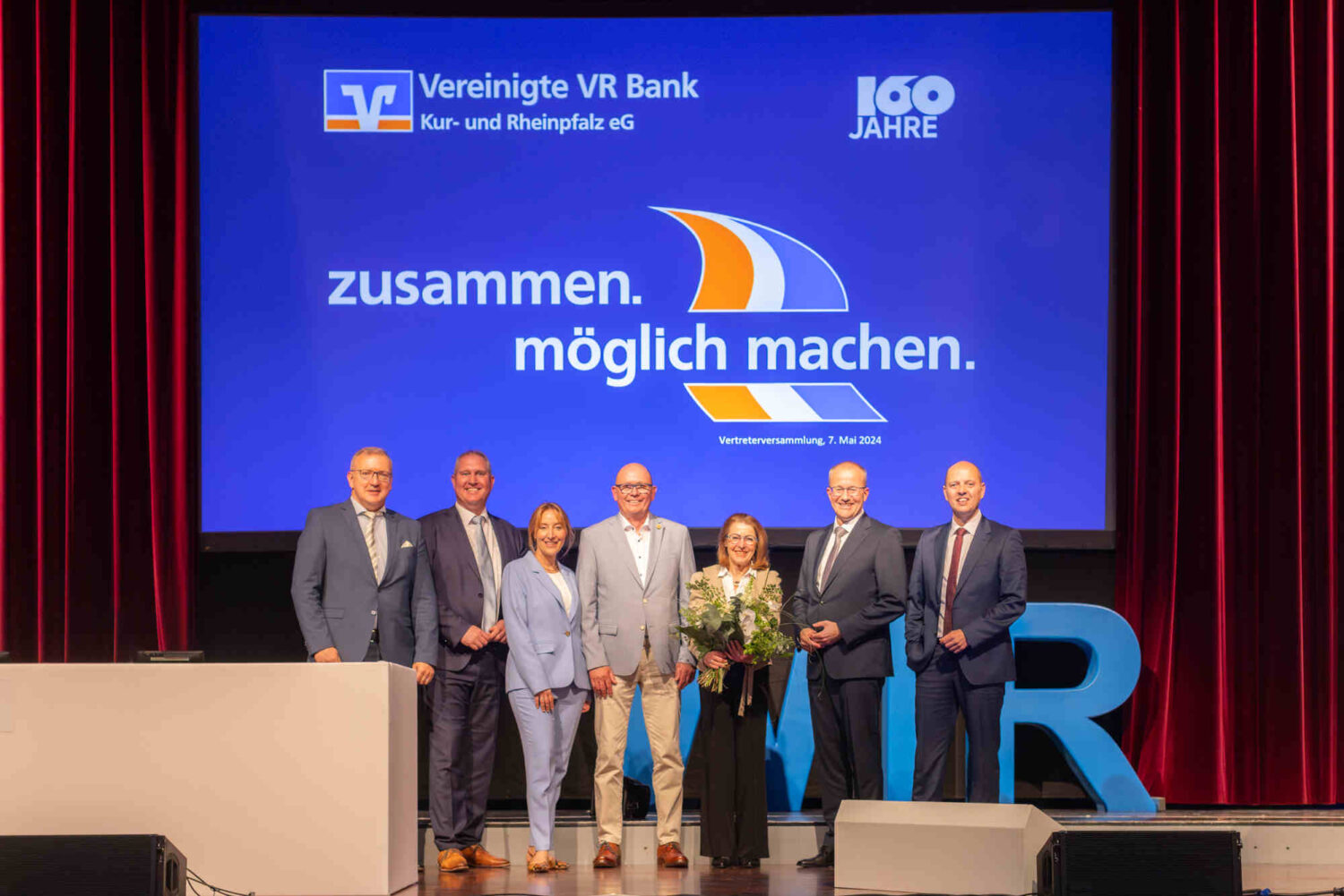 Speyer – Vereinigte VR Bank Kur- und Rheinpfalz blickt bei Vertreterversammlung auf ein herausforderndes Geschäftsjahr 2023 zurück